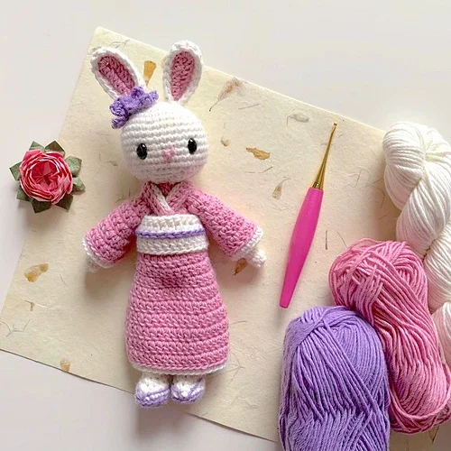 cute amigurumi bunny pattern with pink purple and white yarn