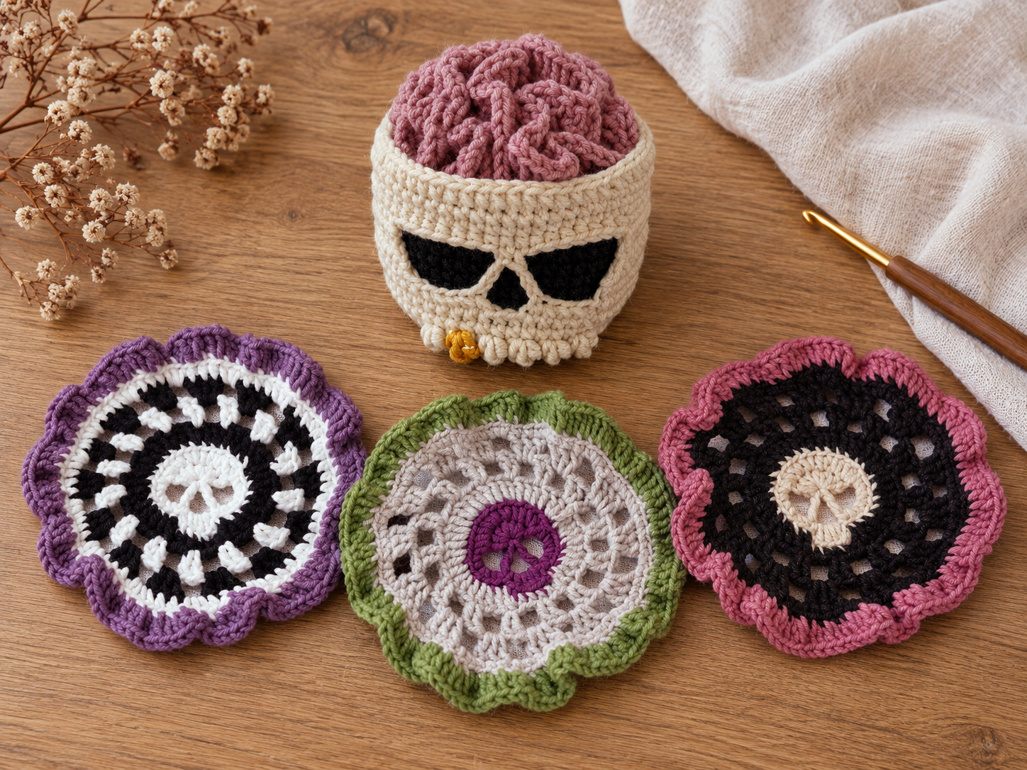 Complete crochet skull coaster set arranged on a light wooden table