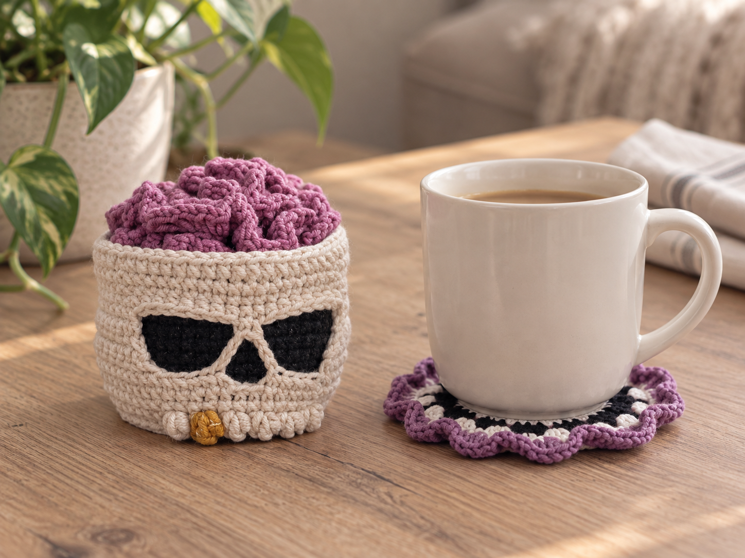 Crochet skull coaster used beneath a warm white mug